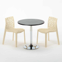 Czarny okrągły stolik 70x70 cm z 2 kolorowymi krzesłami Gruvyer Cosmopolitan 