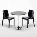 Czarny okrągły stolik 70x70 cm z 2 kolorowymi krzesłami Ice Cosmopolitan Środki