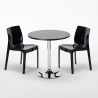 Czarny okrągły stolik 70x70 cm z 2 kolorowymi krzesłami Ice Cosmopolitan Środki