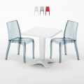 Biały kwadratowy stolik 70x70 cm z 2 kolorowymi przezroczystymi krzesłami Cristal Light Terrace Promocja