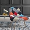 Fotel w salonie z tkaniny w stylu skandynawskim, we wzór patchworkowy, wielokolorowy - Nevada. Sprzedaż
