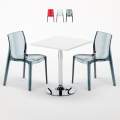 Biały kwadratowy stolik 70x70 cm z 2 kolorowymi przezroczystymi krzesłami Femme Fatale Demon Promocja