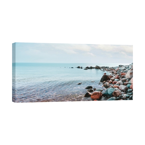 Obraz na płótnie krajobraz morski Kamyki na plaży Pangea Images Promocja