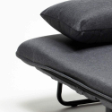 Materiałowy rozkładany fotel z poduszką do salonu lub sypialni Deborah 