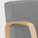 Fotel do salonu z drewnianą podstawą Frederiksberg 